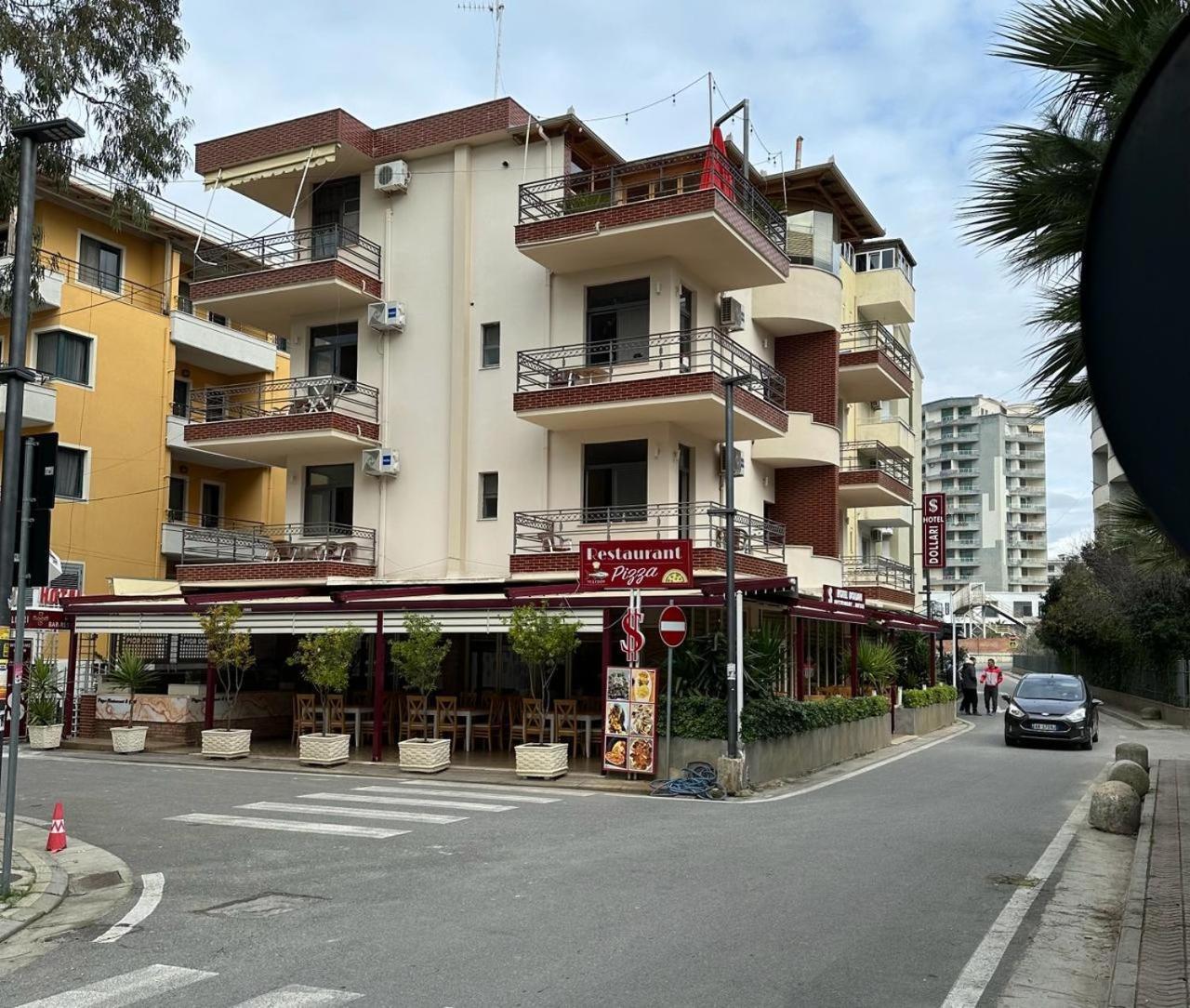 Hotel Dollari Kryemëdhej Bagian luar foto